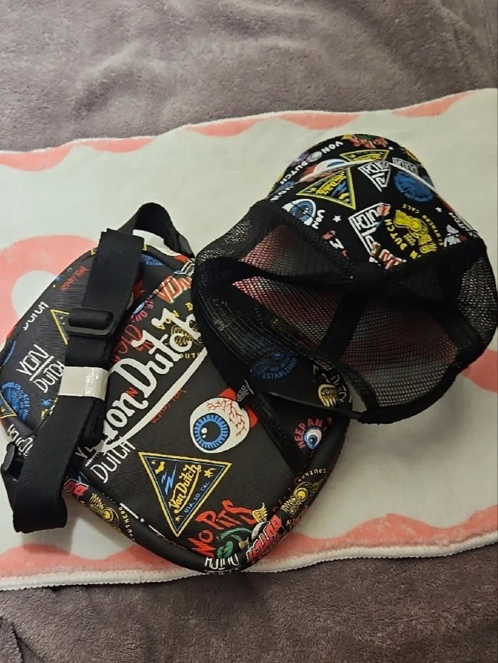 Von Dutch Black Crossbody Bag with Colorful Graphic Accents 2 Piece Bag And Hat